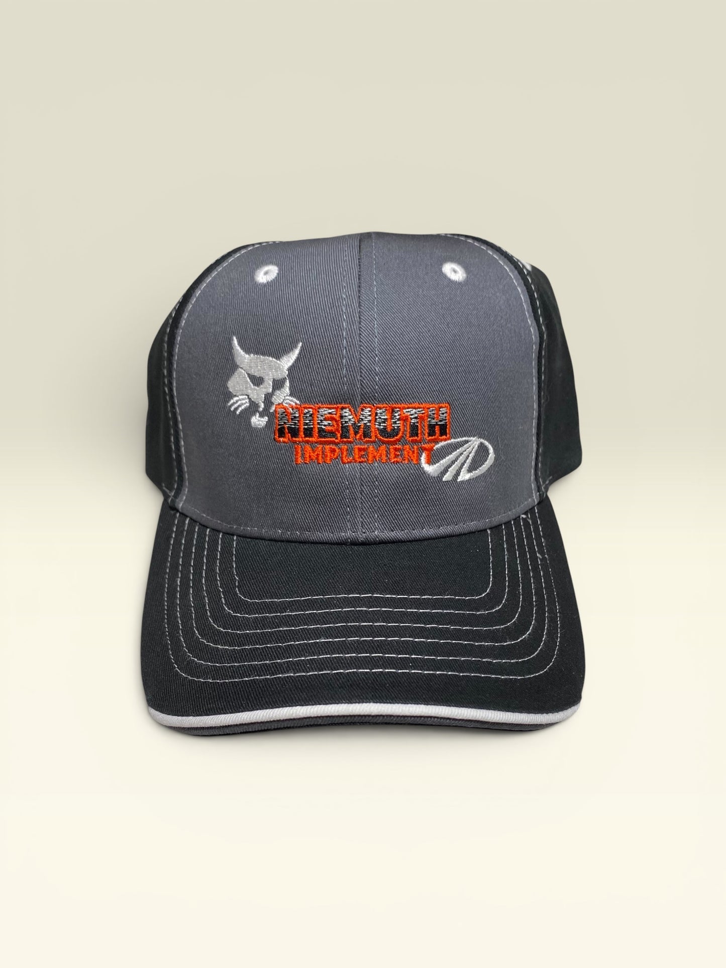 Niemuth Implement Dual Logo Hat