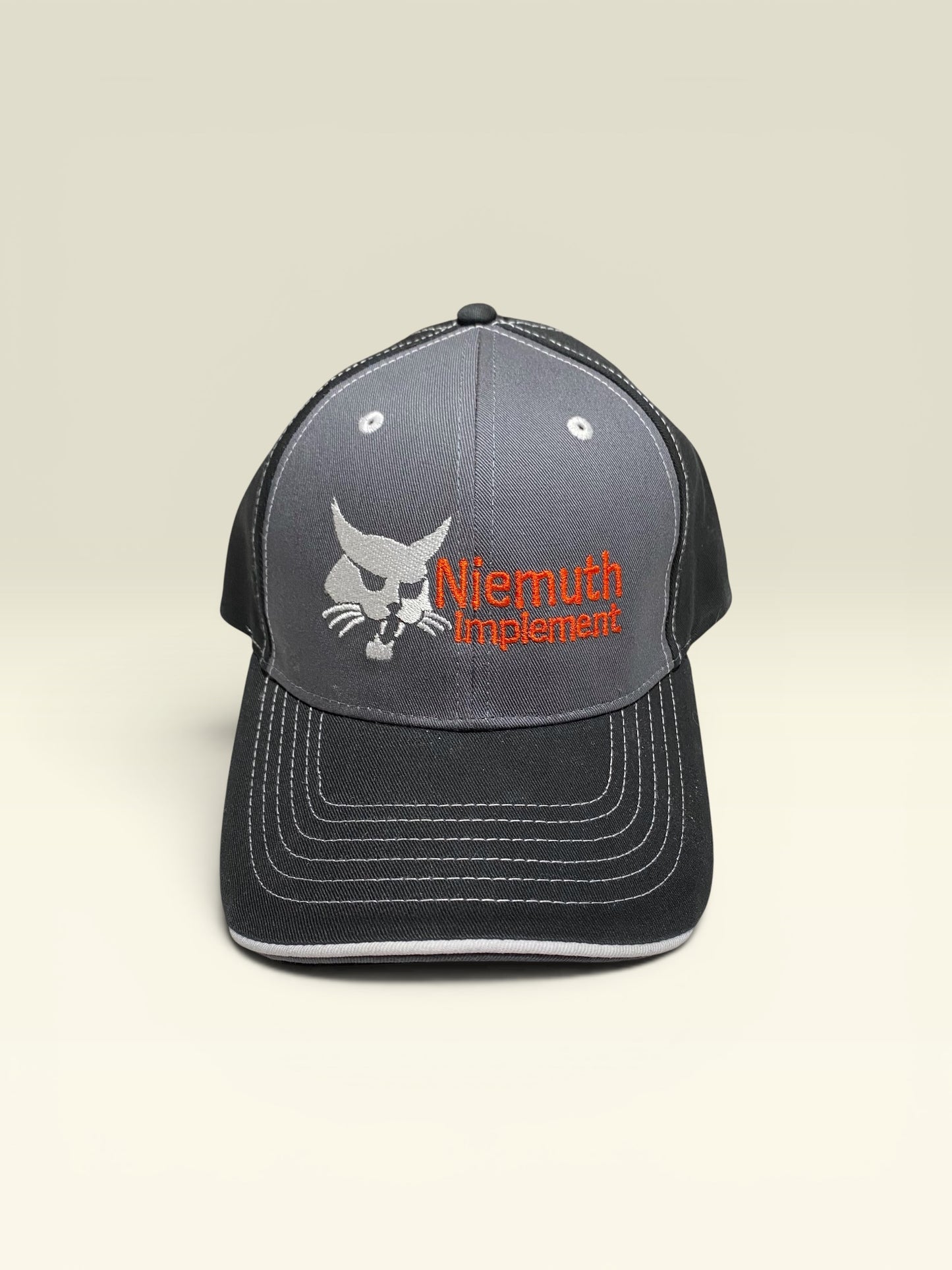 Niemuth Implement Bobcat Logo Hat