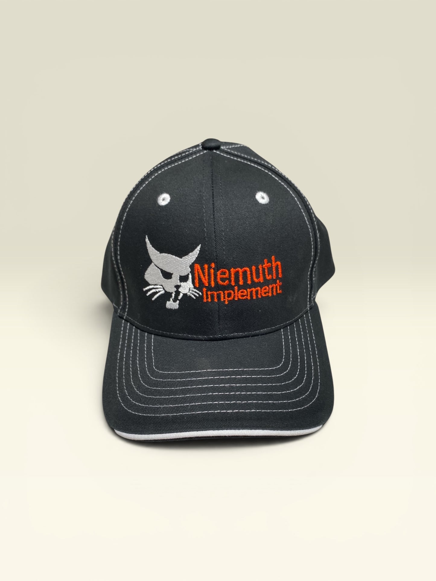 Niemuth Implement Bobcat Logo Hat